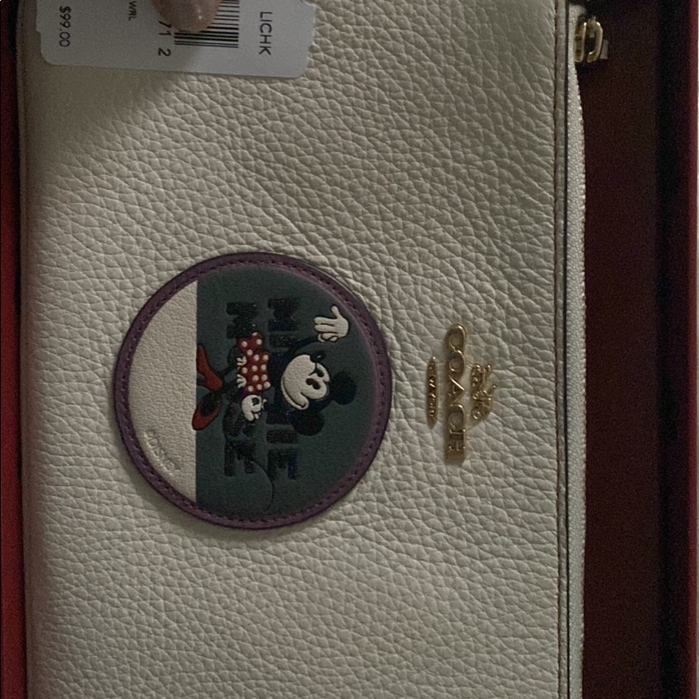 Coach x Disney minnie mouse wristlet